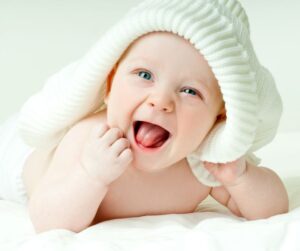 Baby smiling with open mouth